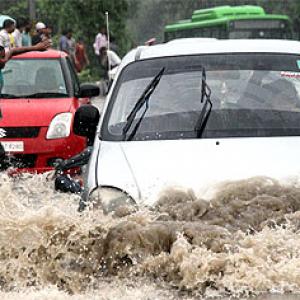 PIX: After blast & quake, heavy rains hit Delhi