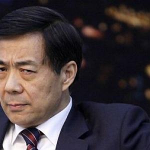 China suspends top leader over murder charges