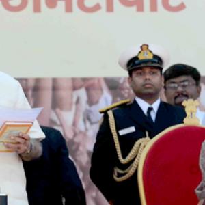 Modi sworn in Gujarat CM, ally JD-U, opp boycott ceremony
