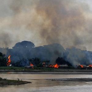 PIX: Assam violence continues; Gogoi meets riots victims