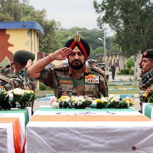 Photos: Army chief's final farewell to brave martyrs