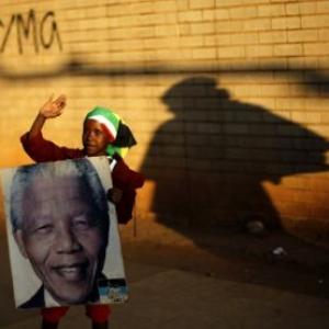South Africa's Mandela shows 'sustained improvement'