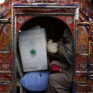 Defying Taliban's threat, Pakistan holds landmark polls