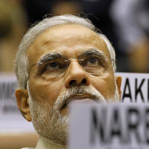 Polarisation or development? Narendra Modi's big dilemma