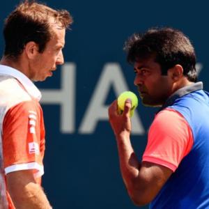 Paes, Sania toil before progressing at US Open