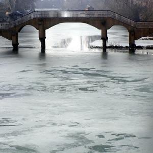 FROZEN: Layer of ice covers Dal Lake