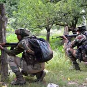 2 security personnel die in deadly gunbattle in Kashmir