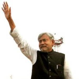 Modi says Nitish nursing PM ambitions, true secularism in Gujarat
