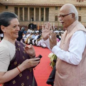 All's well in the House: Modi grabs Rahul's hand; Sonia, Advani chat