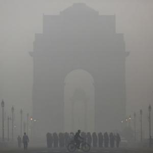 PHOTOS: Super smog hits Beijing, Delhi