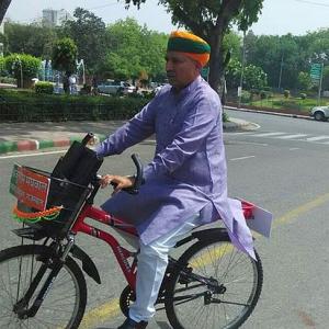 Unfazed by ridicule, this MP continues to cycle to Parliament