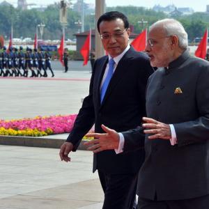 We must try to settle the boundary question quickly: Modi in China