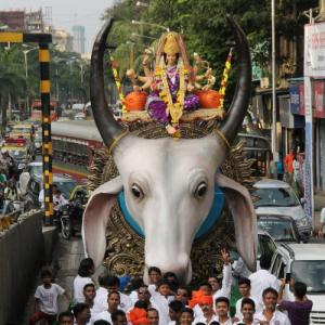 PHOTOS: Devotees bring home Maa Durga