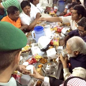 PHOTOS: PM Modi snacks with workers in Saudi and much, much more