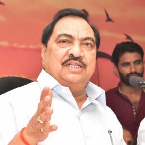 Maha minister Khadse quits; retired judge to probe charges
