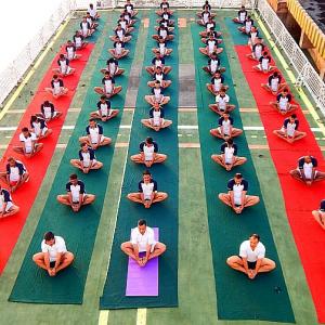 PIX: Yoga on high seas and difficult terrain