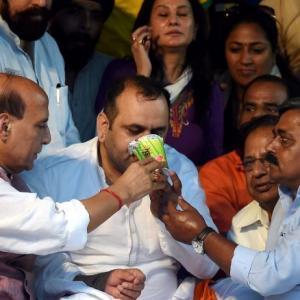 Girri ends fast after Rajnath visits him at protest site
