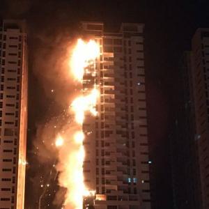 PHOTOS: Towering inferno rips through skyscraper in UAE