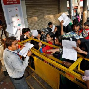 On Day 3, people 'endlessly wait' outside banks and ATMs for cash