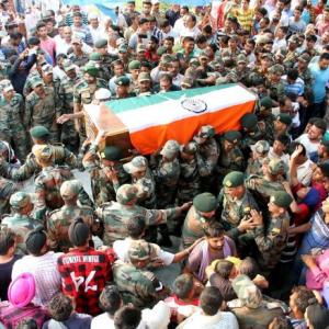 PHOTOS: Nation bids tearful adieu to its fallen heroes