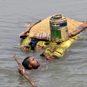 PHOTOS: Floods ravage Bihar, Assam, Bengal; train services hit