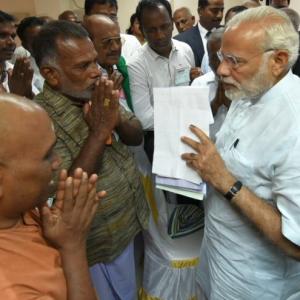 PM visits Ockhi affected areas, announces relief measures