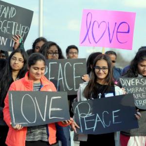 'We love peace': Hundreds march in support of Indian killed in Kansas shooting