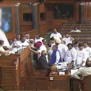Speaker suspends 6 Congress MPs for throwing paper at Chair