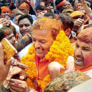 BJP storms to power in UP with 312 seats