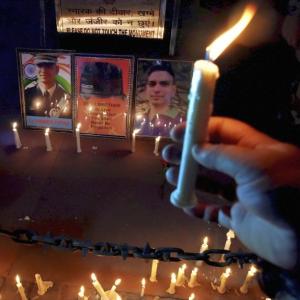 PHOTOS: At India Gate, candle burns brightly for slain Umar Fayaz