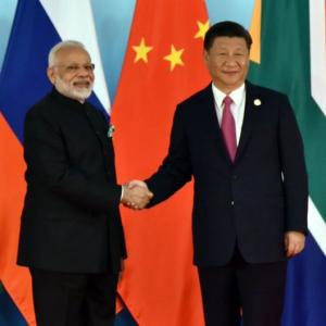 PM, Xi display bonhomie at BRICS Summit