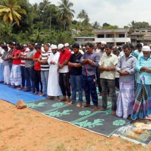 Muslims offer Friday prayers under military protection in Sri Lanka after riots