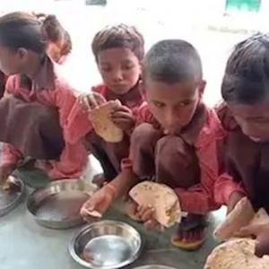 UP schoolchildren eat roti-salt as mid-day meal