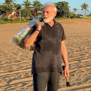 PM Modi goes 'plogging' on Mahabalipuram beach