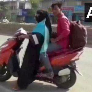 Woman rides 1,400 km to bring back stranded son