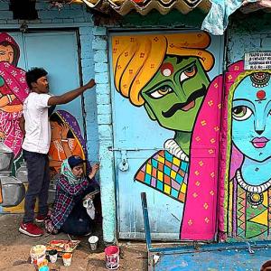 Colourful murals bring a smile to a Delhi slum
