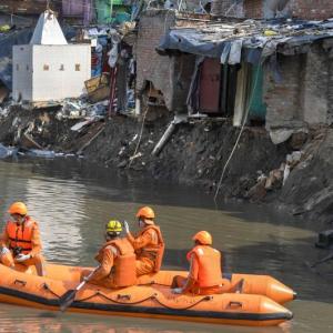 SEE: House collapses as drain in Delhi overflows