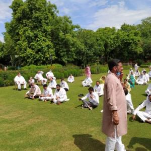 Raj Guv to 'go by Constitution', Cong MLAs end dharna