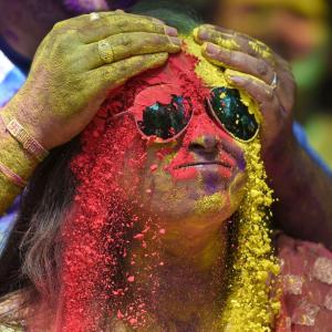 PHOTOS: Indians celebrate Holi amid coronavirus scare