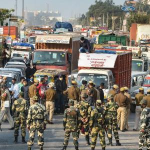 Security upped at Delhi border as farmers close in