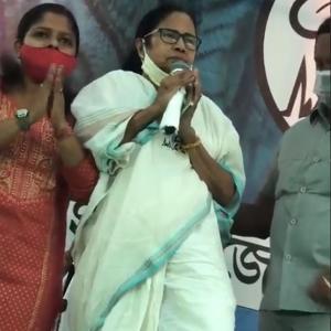 Injured Mamata stands up for national anthem