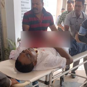 Odisha health minister shot by cop, battles for life