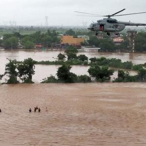 Guj floods: IAF rescues men clinging to electric pole