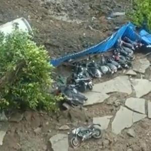 Large part of Mumbai road caves in, vehicles trapped
