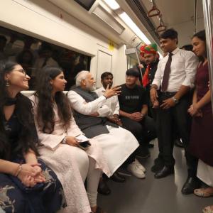 PHOTOS: Modi takes metro ride to Delhi University
