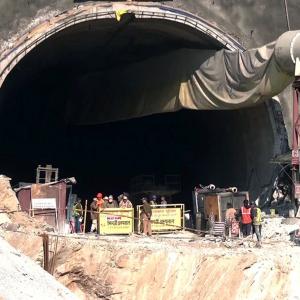 Tunnel workers to be pulled out on wheeled stretchers