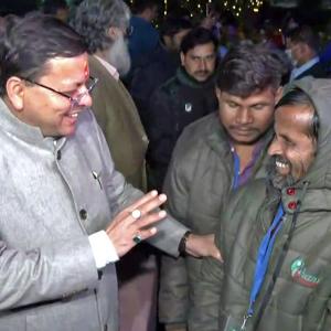 Dhami Celebrates With Rescued Workers