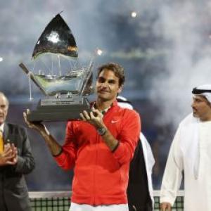 Federer subdues Berdych to win sixth Dubai title