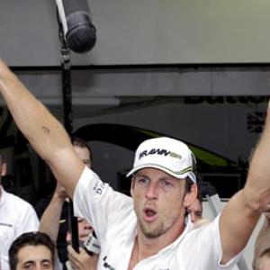 Button spends sleepless night as F1 champion