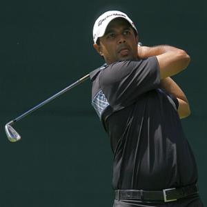 Atwal matches course record to lead at Wyndham